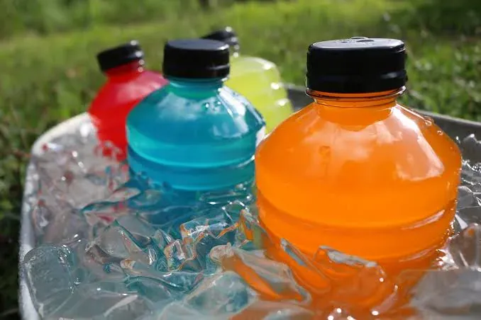 Colourful sports drinks containing sugar and acids that can affect teeth